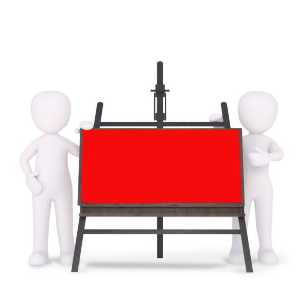 K800_teacher standing beside a whiteboard in red colour